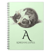 Opgerolde slapende kat aangepaste naam notitieboek (Voorkant)