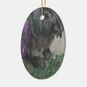 Oplakken met geoorten konijnen keramisch ornament (Links)