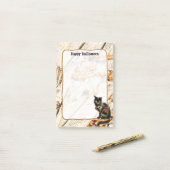 Opmerkingen over foto's van hagekleurde zwarte kat post-it® notes (Op bureau)