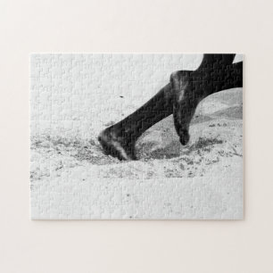 opraken van zand legpuzzel