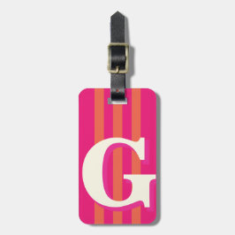 Opvallende gepersonaliseerde initiaal, roze en ora bagagelabel
