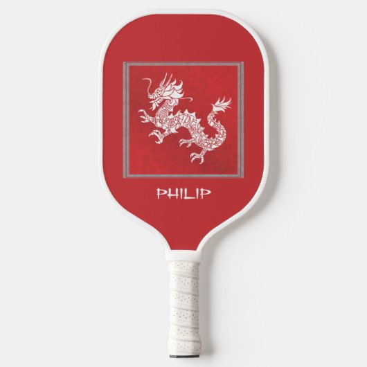 Opvallende rode en witte draak pickleball paddle (Voorkant)
