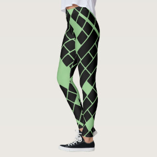 Opvallende zwarte rechthoeken op groene Leggings