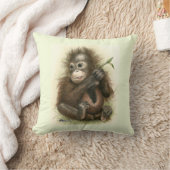 Orang-oetanbaby met bladeren kussen (Deken)
