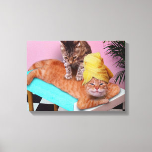 Orange cat enjoying a massage a cat canvas afdruk