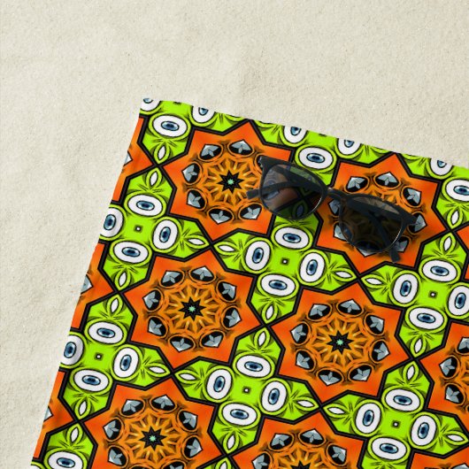 Orange, green and blue patterned  strandlaken (In situ)