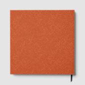 Orange textured surface with swirling pattern gastenboek (Achterkant)
