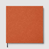 Orange textured surface with swirling pattern gastenboek (Voorkant)