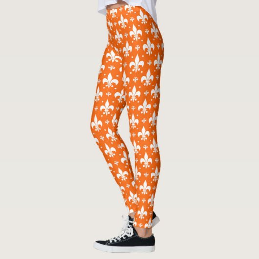 Oranje achtergrond Fleur-de-lis Patroonontwerp Leggings