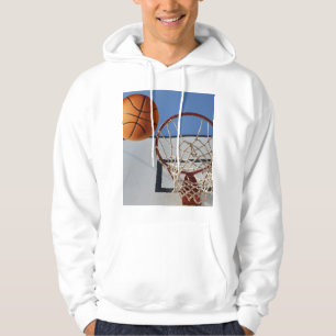 Oranje basketball op het punt van de score, hoodie