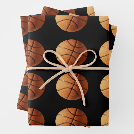 Oranje basketballen op zwart, cadeaupapier, inpakpapier vel (In situ)