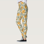 Oranje bladerbloempatroon leggings (Links)