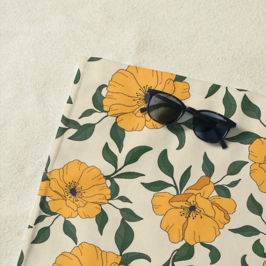 Oranje bladerbloempatroon strandlaken (In situ)