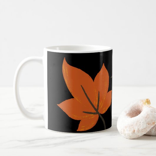 Oranje bladeren op herfstpatroon koffiemok (Met donut)