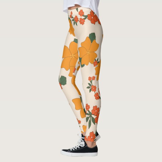 Oranje bloemen, flessenpatroon, patroon van bloeme leggings (Links)
