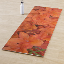 Oranje bloemen yogamat