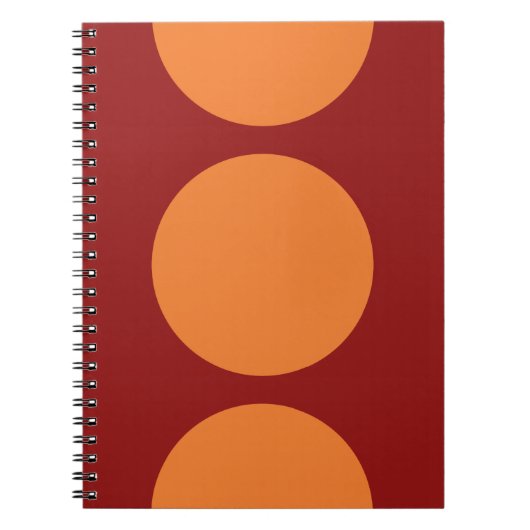 Oranje cirkels op rood notitieboek (Voorkant)