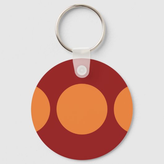 Oranje cirkels op rood sleutelhanger (Voorkant)