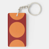 Oranje cirkels op rood sleutelhanger (achterkant)