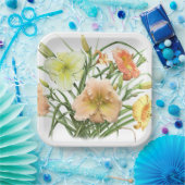 Oranje dagbladen over botanisch ontwerp papieren bordje (Feest)