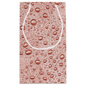 Oranje druppeltjes klein cadeauzakje (Achterkant)