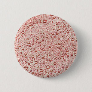 Oranje druppeltjes ronde button 5,7 cm
