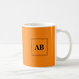 Oranje effen kleur met monogram koffiemok
