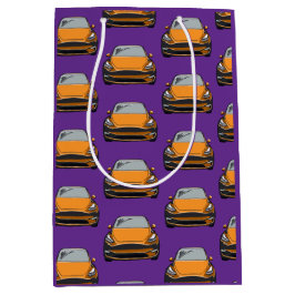 Oranje elektrische auto SUV auto Paarse achtergron Medium Cadeauzakje