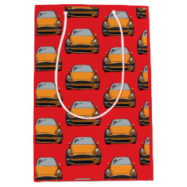 Oranje Elektrische Voertuig SUV Auto Rode Achtergr Medium Cadeauzakje