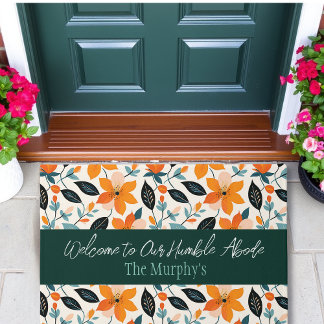 Oranje en blauw gebladerte en bloemen gepersonalis deurmat
