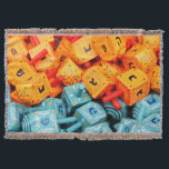 Oranje en blauwe Dreidels Deken<br><div class="desc">Foto van kleurrijke oranje en blauwe droesels. Afbeelding van Adiel lo, wikicommons.</div>