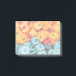 Oranje en blauwe Dreidels Post-it® Notes<br><div class="desc">Foto van kleurrijke oranje en blauwe droesels. Afbeelding van Adiel lo,  wikicommons.</div>