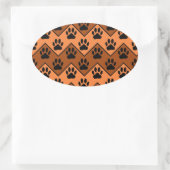 Oranje en bruine Chevron met een hond-paw-patroon Ovale Sticker (Tas)