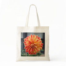 Oranje en gele dahlia op een canvas tas