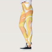 Oranje en gele wervelingen met Stippen Leggings (Links)