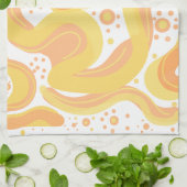 Oranje en gele wervelingen met Stippen Theedoek (Gevouwen)