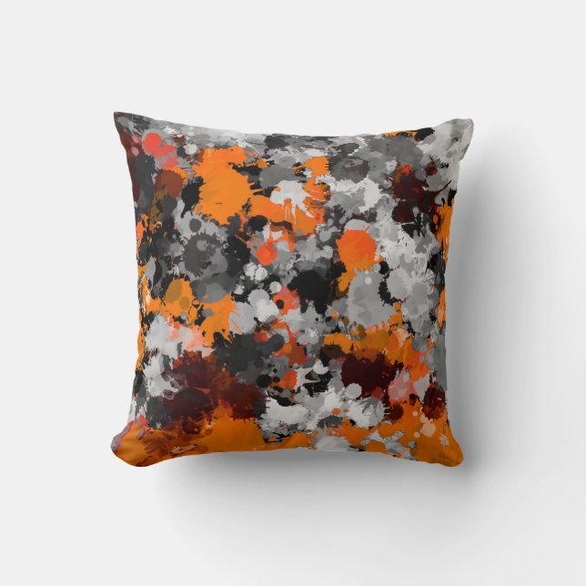 Oranje en grijze verfspatten kussen (Voorkant)