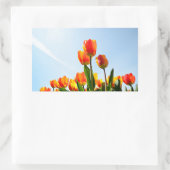 Oranje en rode tulpen van onderaan rechthoekige sticker (Tas)