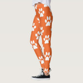 Oranje en wit zwenkpatroon leggings (Links)