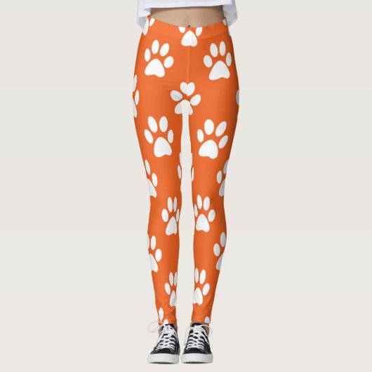 Oranje en wit zwenkpatroon leggings (Voorkant)