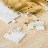 Oranje en witte kat met stoel legpuzzel (Zijkant)