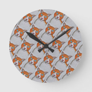 oranje en witte kat wandklok