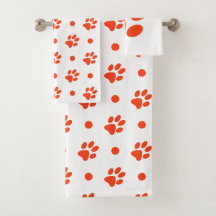 Oranje en witte pootafdrukken en stippen
