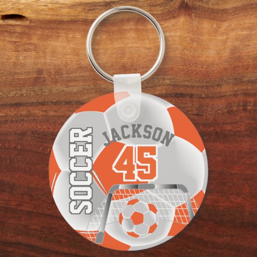 Oranje en witte ⚽ sleutelhanger (Achterkant)
