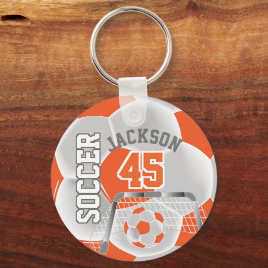 Oranje en witte ⚽ sleutelhanger (Voorkant)