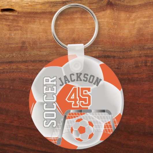Oranje en witte ⚽ sleutelhanger (Achterkant)