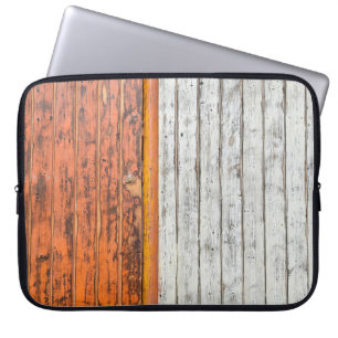 Oranje en witte wandverf laptop sleeve
