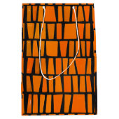 Oranje en zwart-afrikaans stammenpatroon medium cadeauzakje (Voorkant)