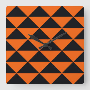 Oranje en zwarte driehoeken vierkante klok