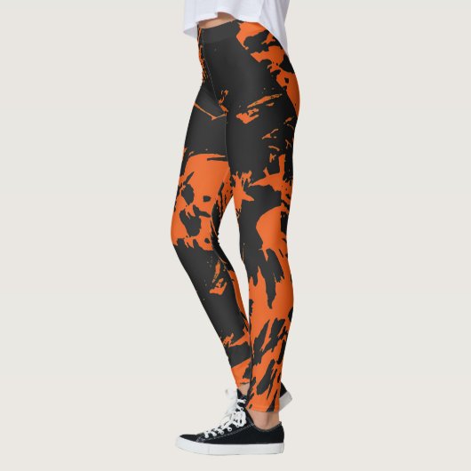 Oranje en zwarte graffiti-platter leggings (Links)